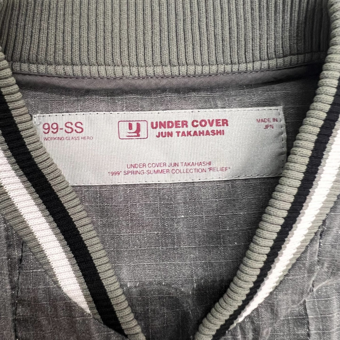 UNDERCOVER 1999SS RELIEF OVER-DYED GREY VERSITY JACKET